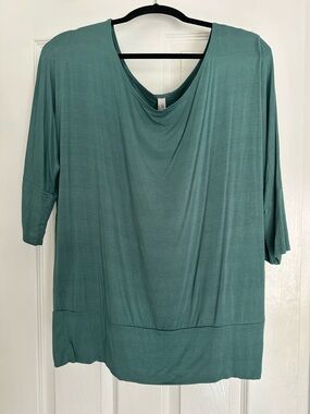Soft flirty versatile off the shoulder top